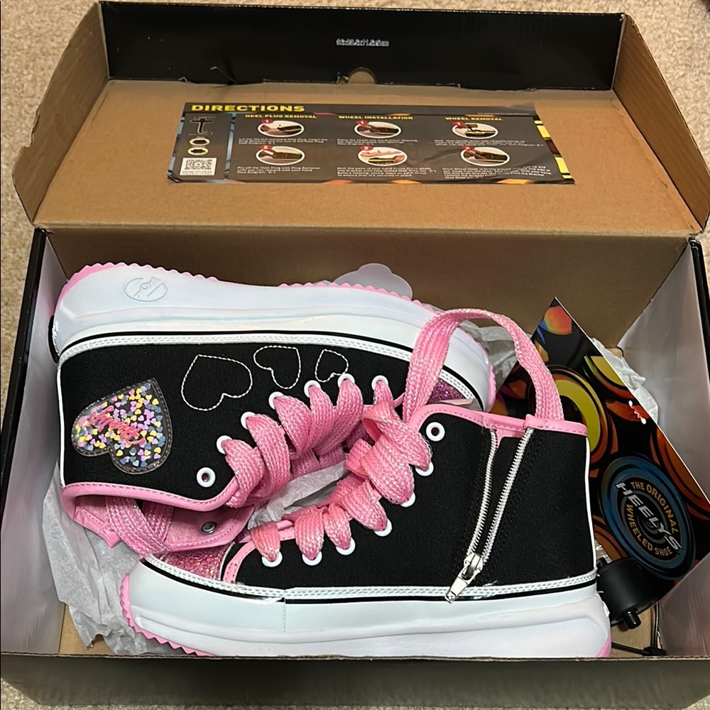 Heelys Pink and Black Sneakers with Classic High-Top Design